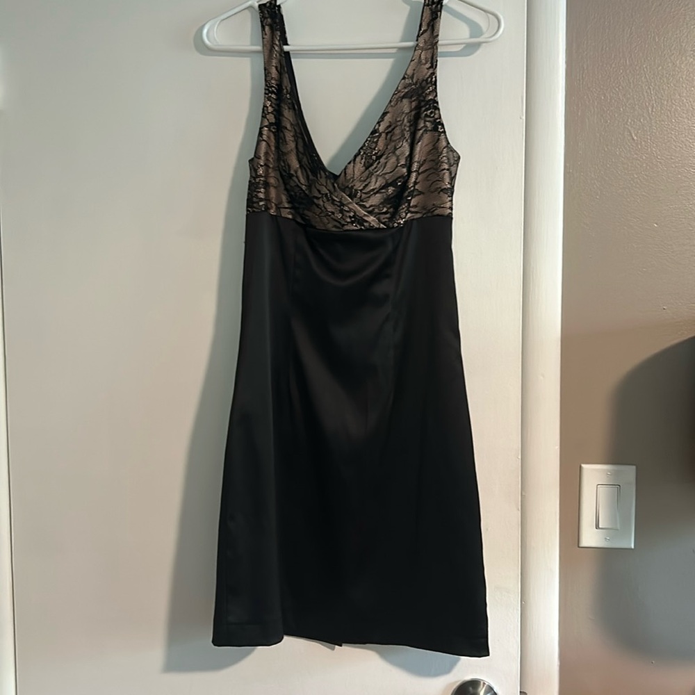 Women’s size 2 black dress with straps and flower pattern lace on the top